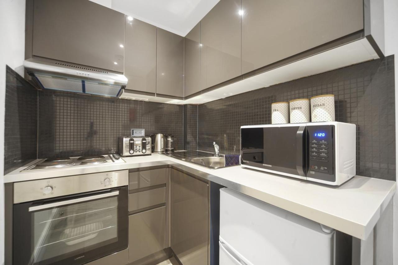 Studio Apartment By Homely Stays Londra Exterior foto